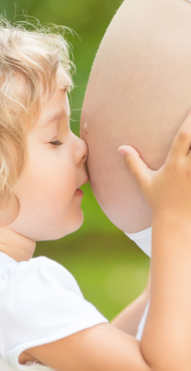 Are there any risks for my child if I breastfeed during pregnancy?